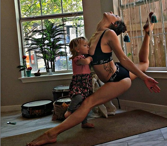 Mom Does YOGA While Breastfeeding Her Two-Year Old Daughter