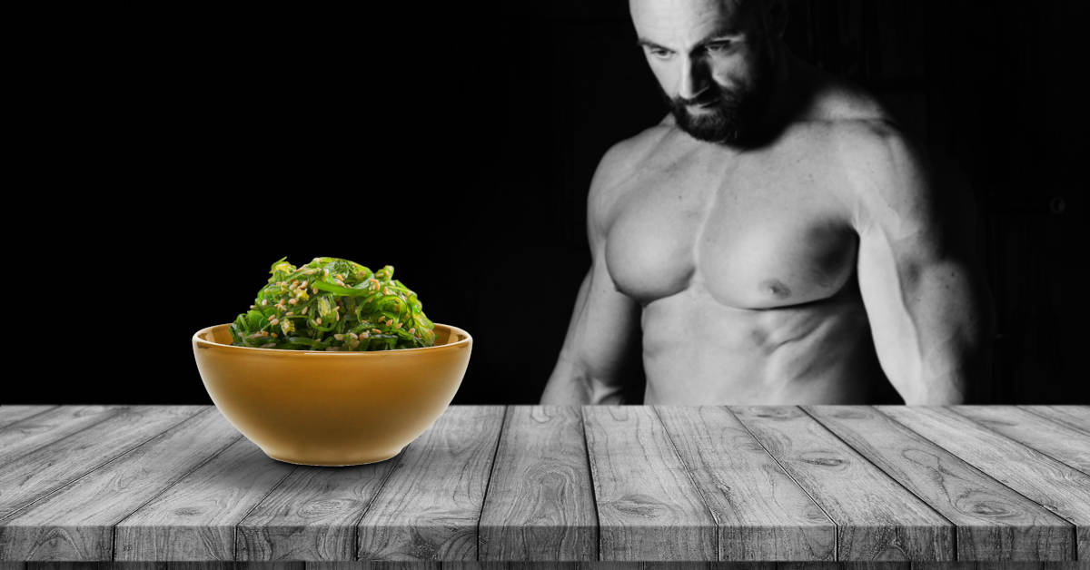 9-surprising-superfoods-featured-image-body-builder-looking-at-seaweed